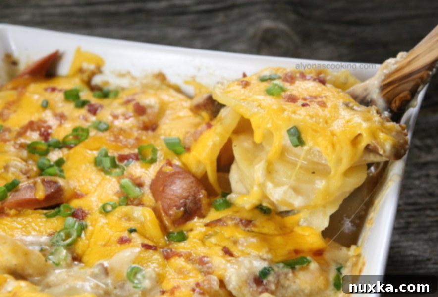 Detailed close-up of the creamy, cheesy loaded scalloped potatoes