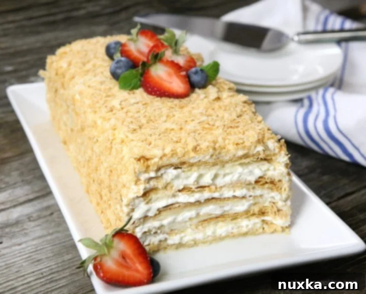 Classic Napoleon Cake with Layers of Flaky Pastry and Creamy Whipped Frosting