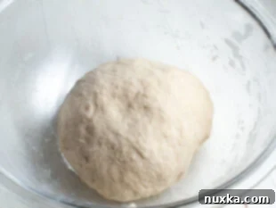 Pretzel dough being kneaded