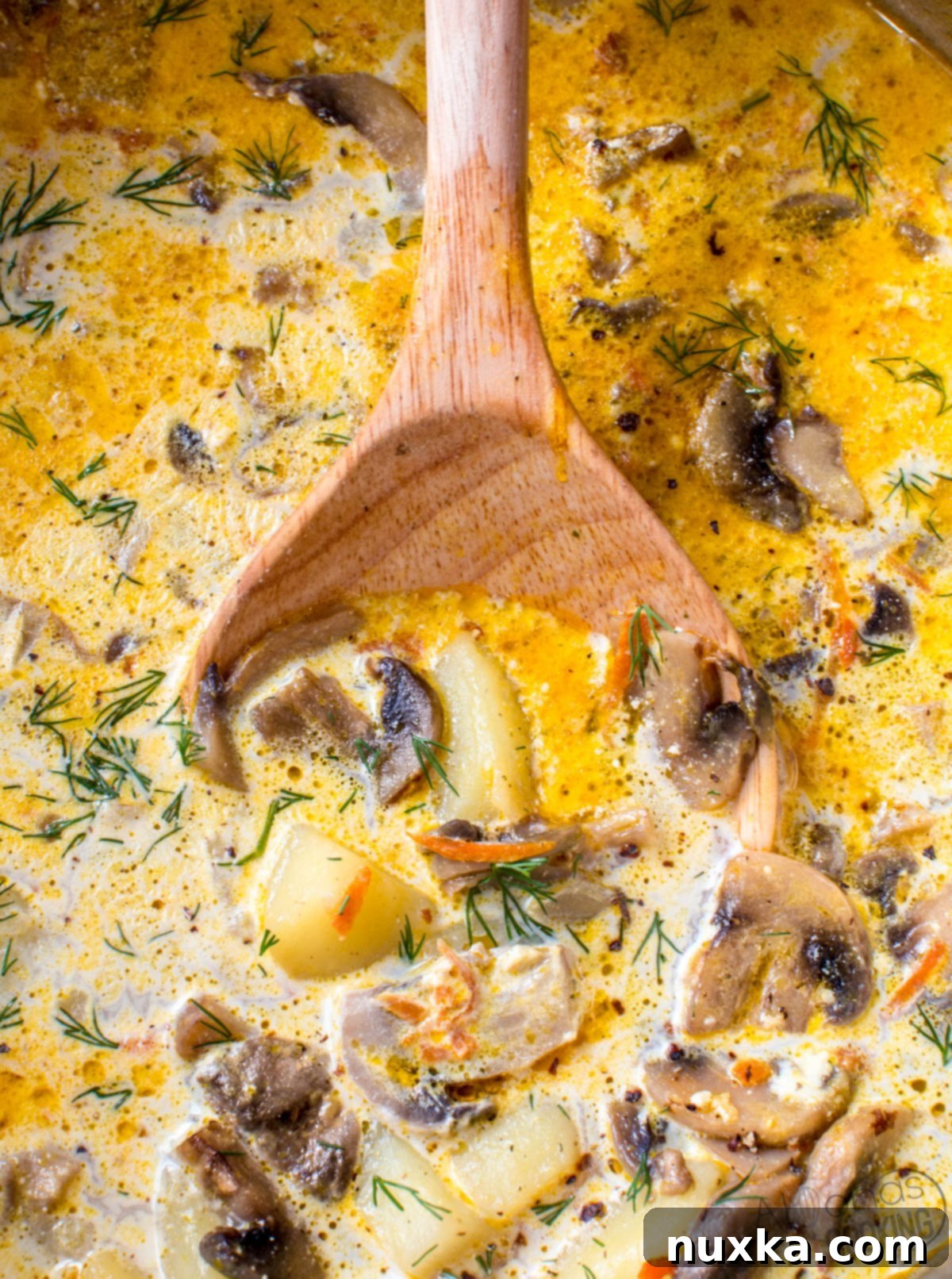this soup is done in under 30 minutes! I think everybody should have a mushroom recipe they can easily make and this one exceeds them all. Believe me, I've made the Hungarian mushroom soup, back when All Recipes published it years ago, and this mushroom soup recipe is way better! #cream #soup #pot #cook #potato mushroom soup recipe