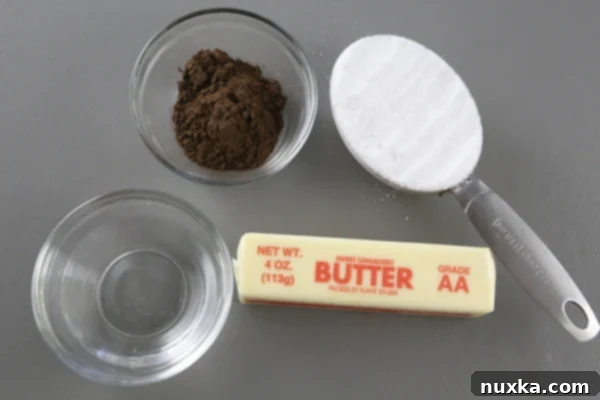 Measuring out cocoa powder and sugar for the ganache.