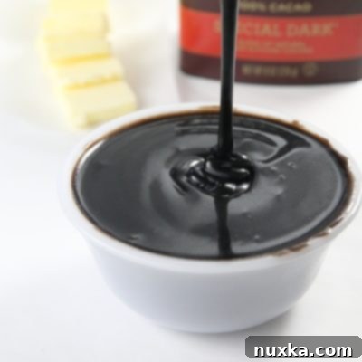 A perfectly frosted cake with cocoa ganache.