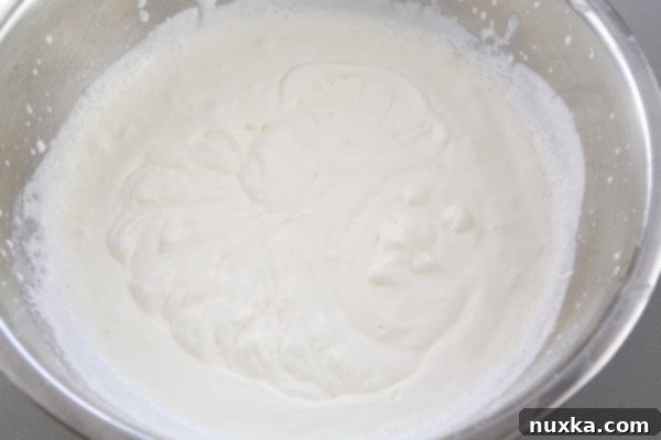 Whipping heavy cream in a bowl