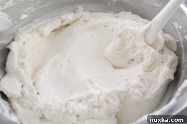 Mixing all frosting ingredients until well combined