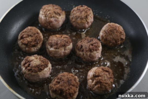 Salisbury Steak with Mushroom Gravy Step 3: Searing Patties