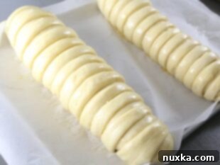 brushed tops of poppy seed rolls