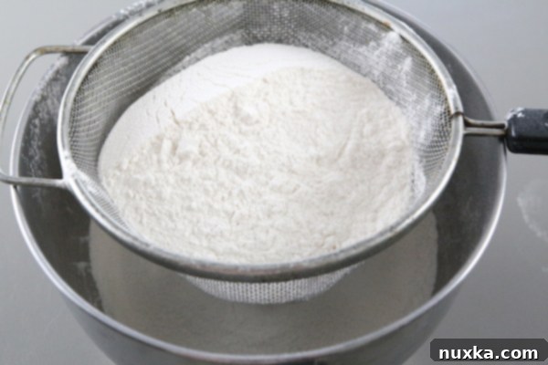 Adding flour for poppy seed rolls dough