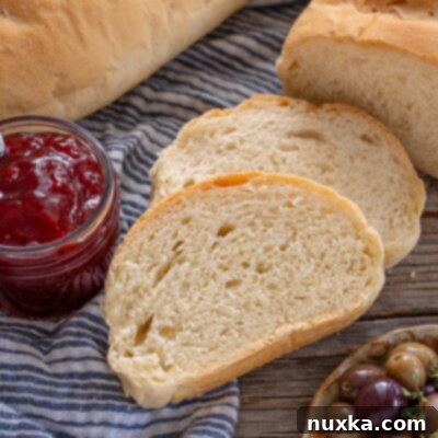 Authentic Italian Bread Recipe Video Guide 7 fluffy Italian Bread loaf sliced