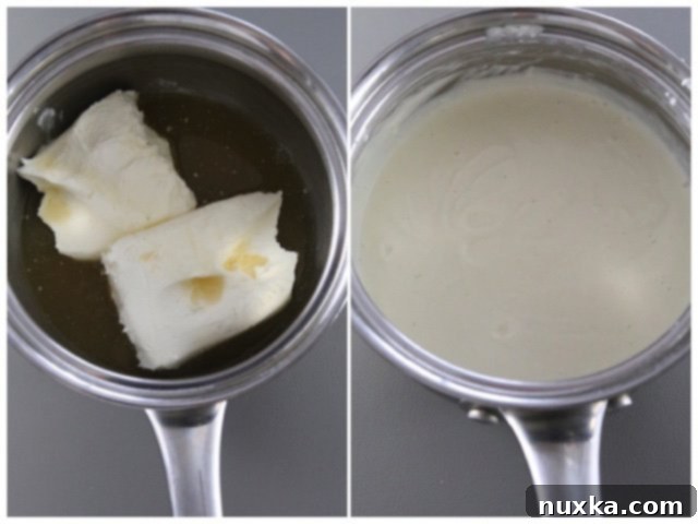 Combining cream cheese and chicken broth in a saucepan for the pasta sauce