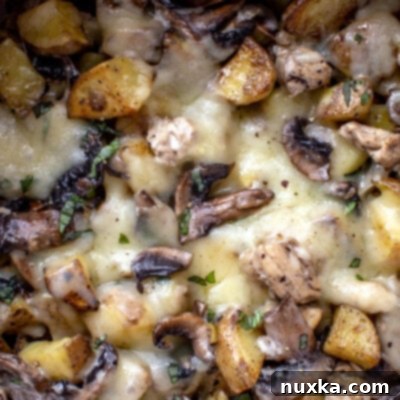 Loaded Chicken & Mushroom Potato Bake 4 loaded potatoes with mushrooms, chicken and onion baked