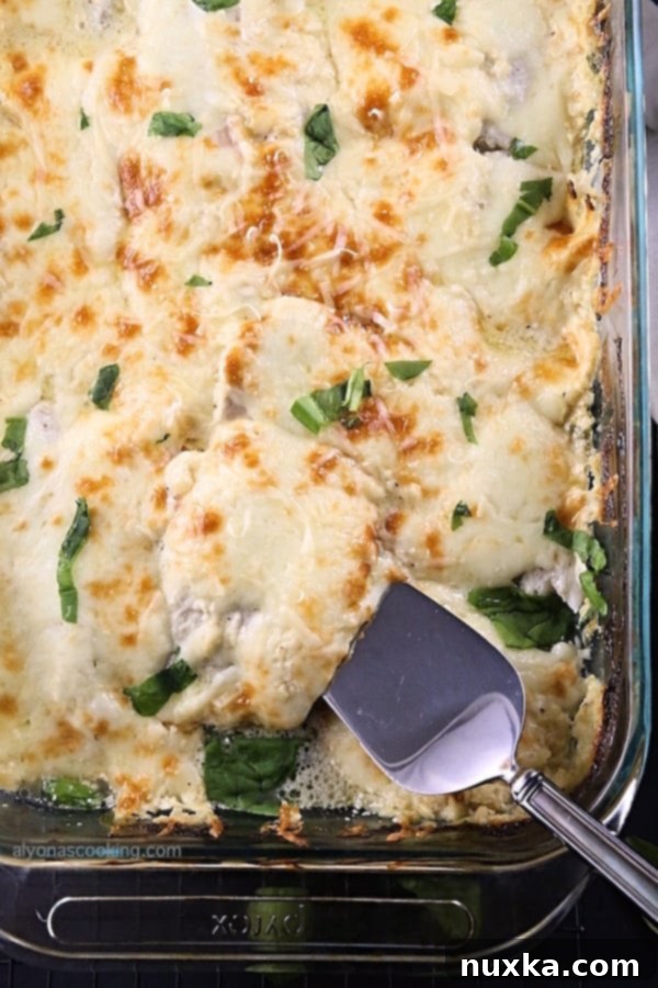 Baked Tilapia and Spinach Casserole, perfectly golden and bubbly.