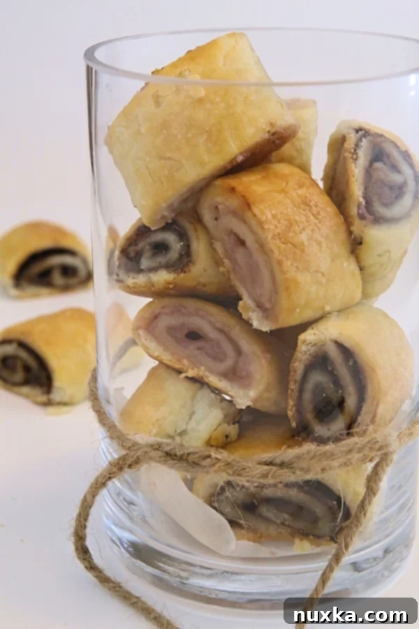 Delicious, flaky Costco copycat rugelach pastries on a plate, ready to be enjoyed.