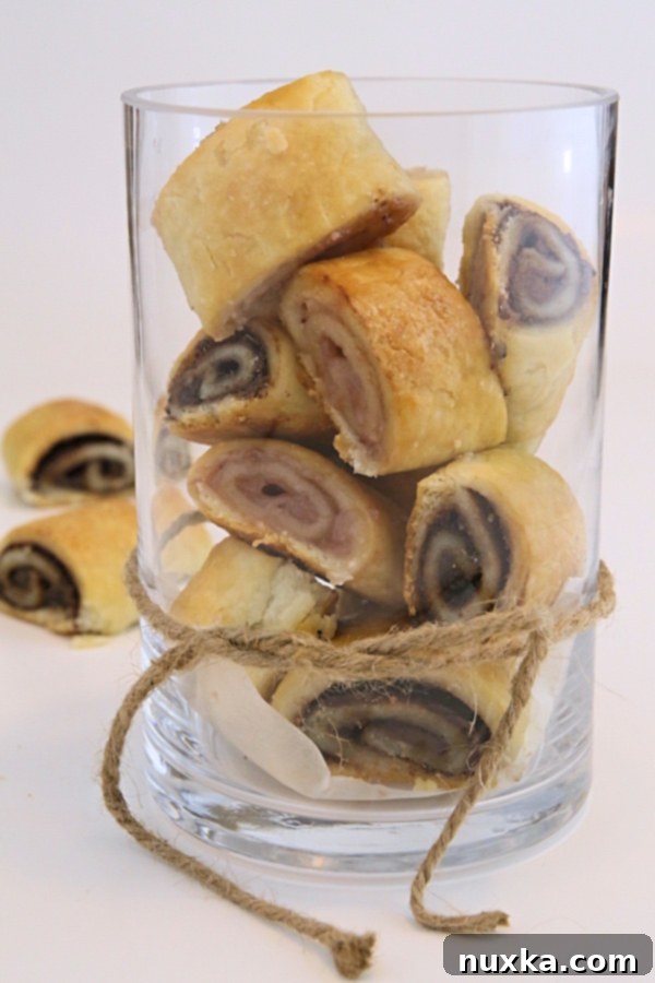 Freshly baked Costco copycat rugelach, golden brown and sliced, ready to be served.