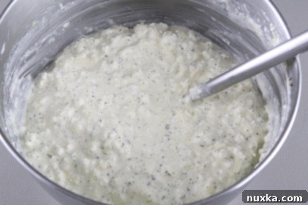Mixing the cheese filling for lasagna roll-ups