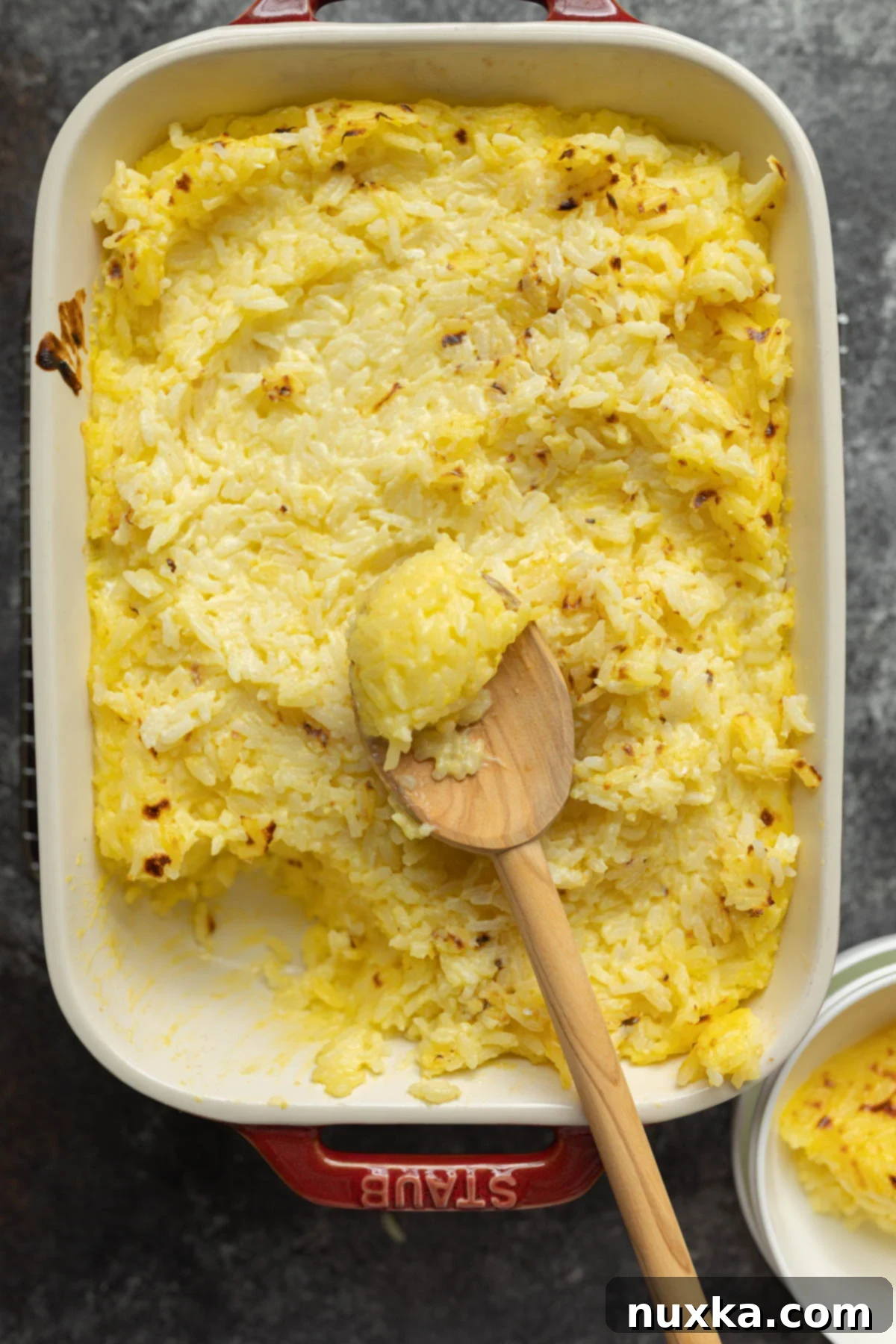 baked rice pudding in a baking dish, golden brown and creamy