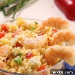 Shrimp Couscous Salad with colorful vegetables and feta