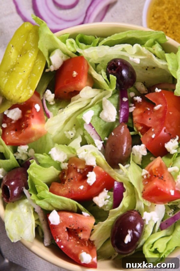 Panera Bread Copycat Greek Salad with crisp lettuce, feta, and olives