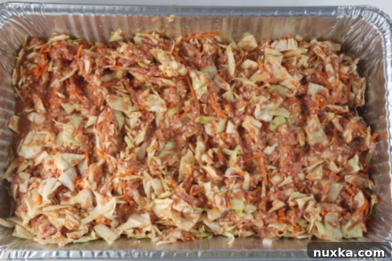 unstuffed cabbage rolls in a casserole to be baked