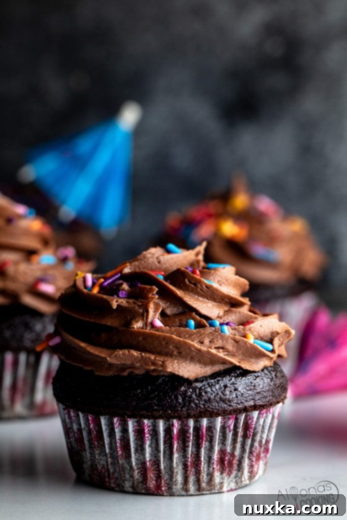 Super Moist Chocolate Cupcakes with rich frosting and sprinkles, a truly delightful homemade treat