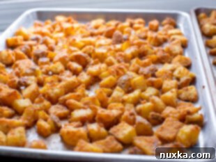 taco bells cheesy fiesta potatoes on a baking sheet baked at 475 degrees