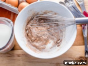 Step 1: Whisking flour, spices, and milk.