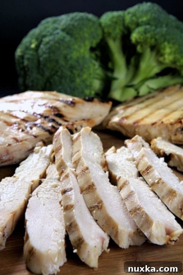 Delicious grilled chicken breast strips, perfectly cooked and ready for freezing as part of an easy meal prep strategy.