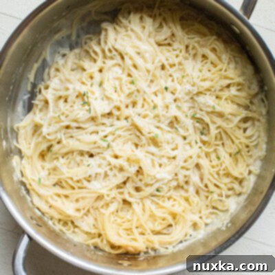 Heavenly Garlic Parmesan Angel Hair 2 creamy parmesan garlic angel hair pasta all made in one pan for an easy dinner or side dish