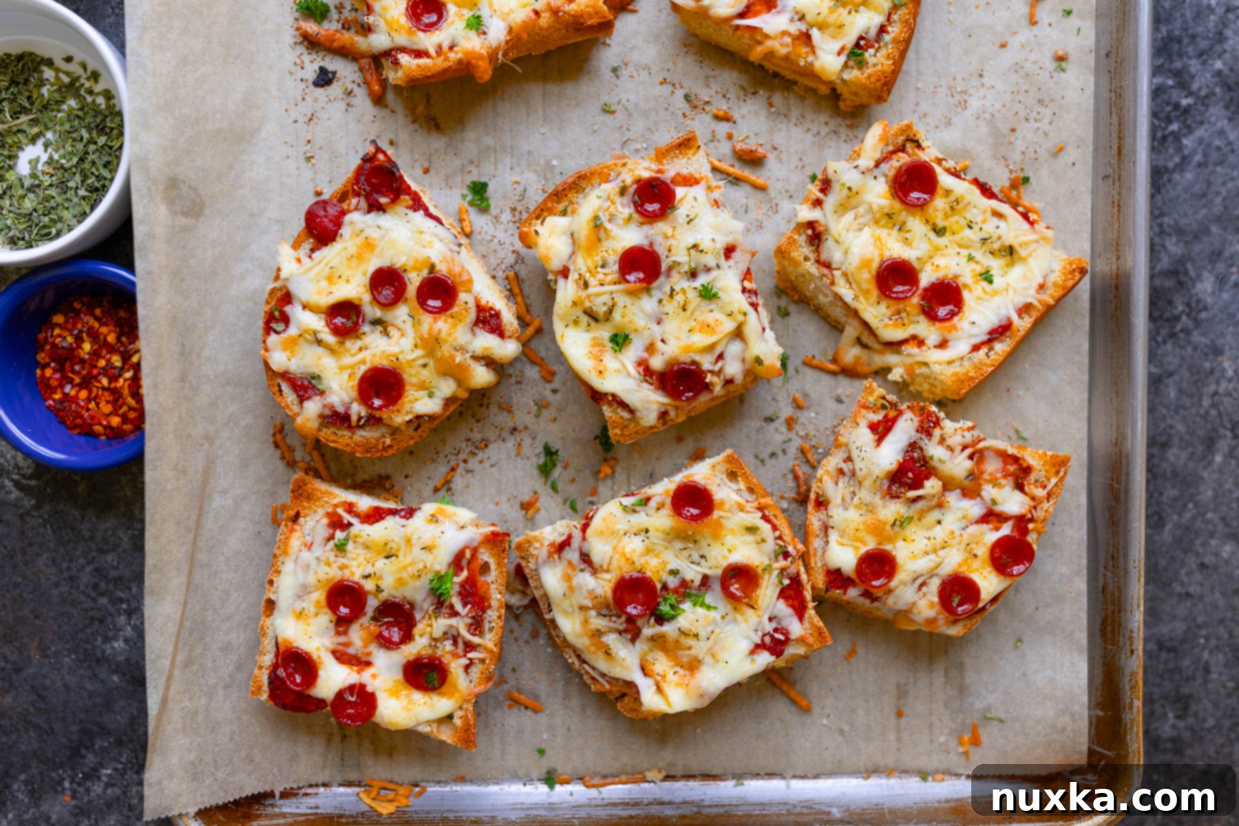 Homemade French Bread Pizza topped with rich tomato sauce, melted mozzarella, and savory pepperoni slices