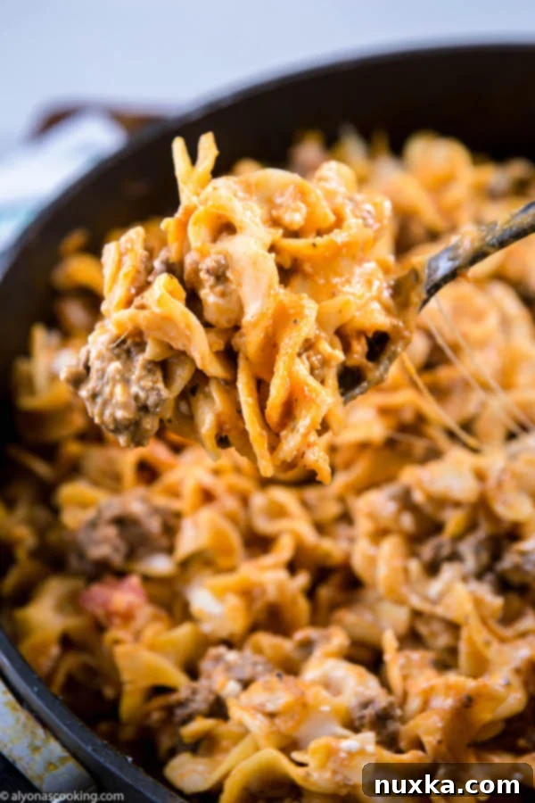Close-up shot of One-Pan Ground Beef Stroganoff in a skillet, ready to serve