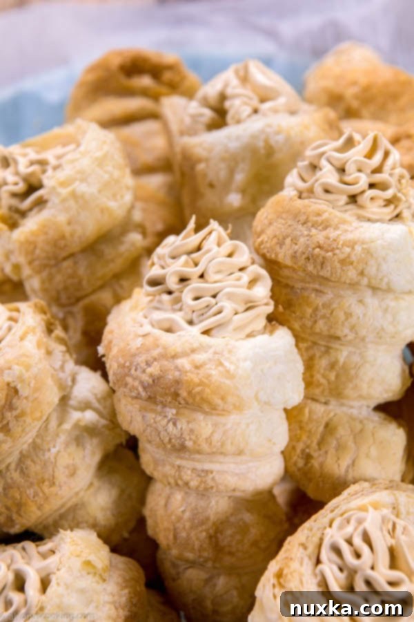Detailed step-by-step process of making cream horns, showing puff pastry preparation