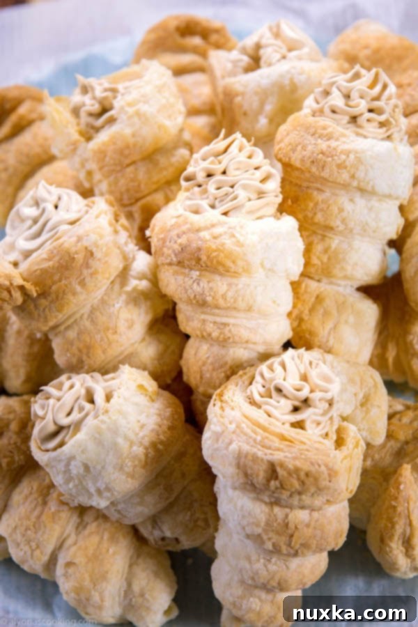 Beautifully piped and finished Cream Horns, ready to be served