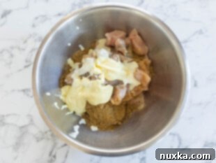 combining the chicken kabob marinade ingredients in a bowl