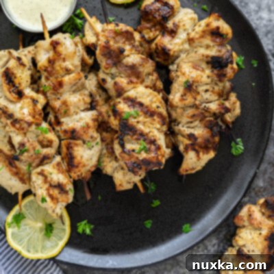 Amazingly Juicy Chicken Skewers with a Mayonnaise Marinade 2 grilled chicken kabobs marinated in mayonnaise