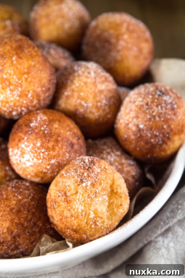 Freshly fried Ukrainian Ponchiki on a plate