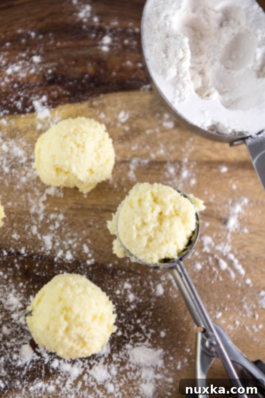 Shaping farmer's cheese donut holes (Ponchiki) dough