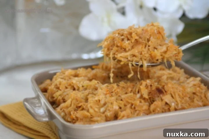 A warm bowl of braised cabbage with caramelized onions and sauerkraut