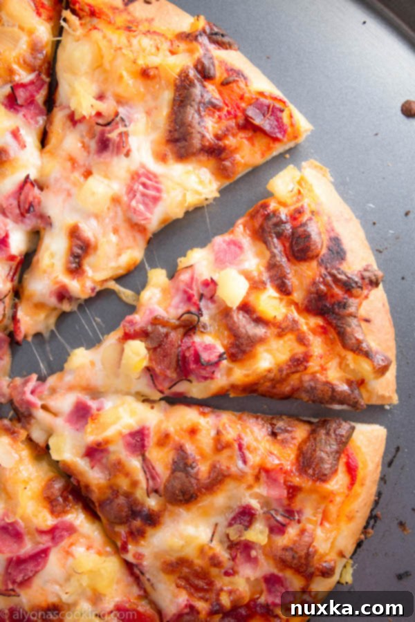 Hawaiian pizza with golden brown crust