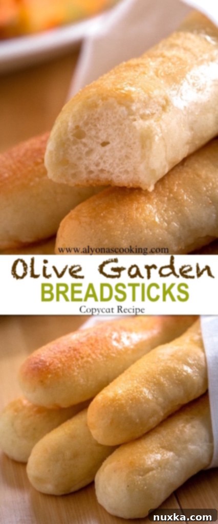 Stack of fluffy, homemade Olive Garden style breadsticks, ready to eat