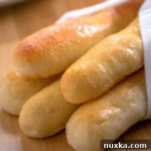 A basket of freshly baked homemade Olive Garden breadsticks