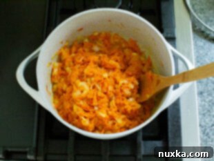 Sautéing onions and carrots for stuffed peppers