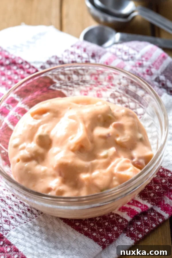Freshly made Thousand Island dressing in a glass jar