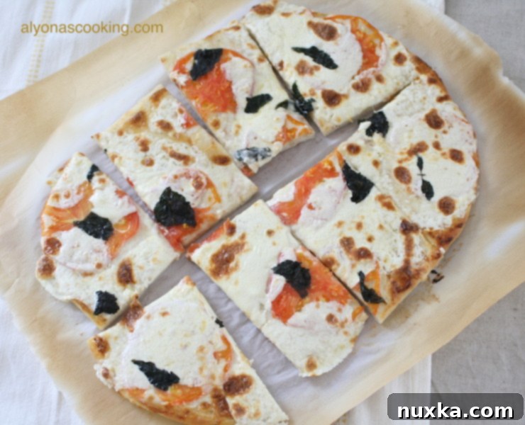 Delicious sliced grilled white pizza ready to be served
