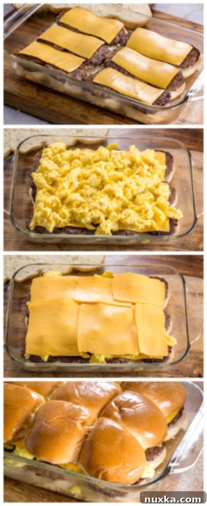 Closeup of Sausage, Egg, and Cheese Breakfast Sliders, showing the layers of ingredients on a cutting board, ready to be pulled apart.
