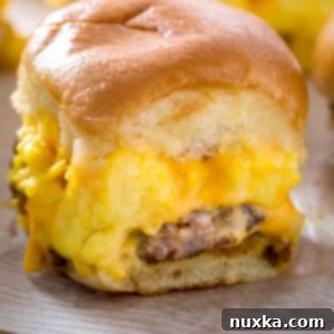 Irresistible Sausage Egg and Cheese Sliders 6 Sausage, Egg, and Cheese Breakfast Sliders recipe image