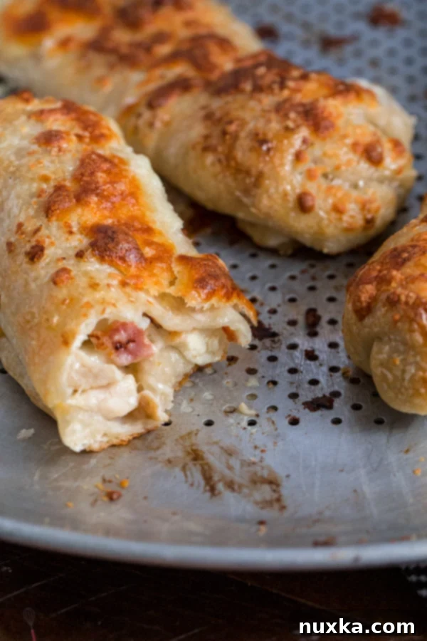 Finished Costco Chicken Bakes on a baking sheet