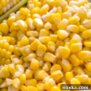 Freshly frozen corn kernels ready for storage.