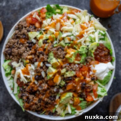 Elevate Your Taco Salad with Homemade Catalina Dressing 2 taco salad with homemade Catalina Dressing in a white bowl