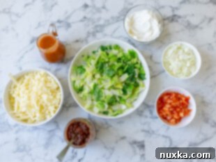 all the taco toppings for taco salad (lettuce, tomatoes, onions, cheese, salsa, sour cream, Catalina Dressing)