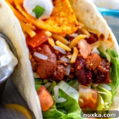 Pillowy Soft Tacos 5 Soft Shell Tacos with hearty beef and beans filling