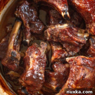 Succulent Braised BBQ Ribs 2 Close-up of deliciously braised pork short ribs with sticky BBQ sauce